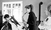 Saxophonistin, Foto: Eric Gross, Lizenz: Klingendes Gut GbR