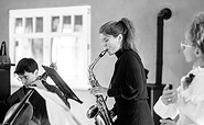 Saxophonistin, Foto: Eric Gross, Lizenz: Klingendes Gut GbR